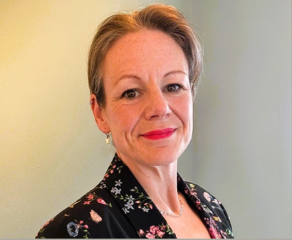 A professional headshot of Ffion Robinson
