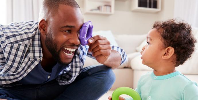 dad playing with child