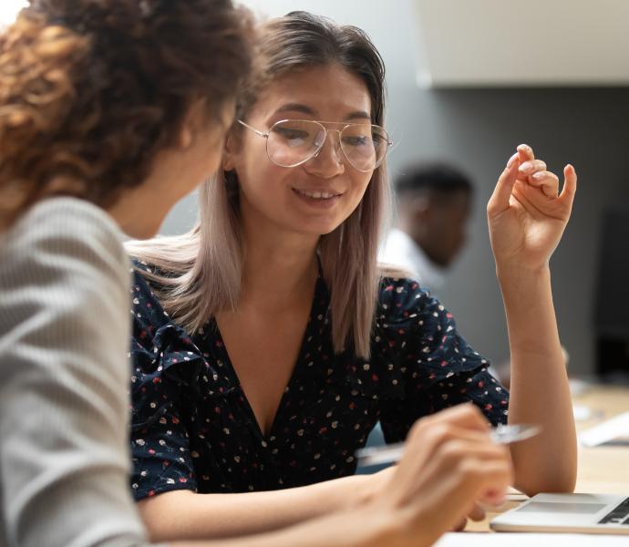 A student having a discussion with a professional 
