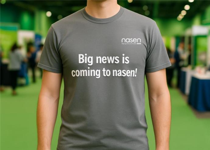 An AI-generated image of a man wearing a grey t-shirt that reads 'big news is coming to nasen'. The man stands in an exhibition space.