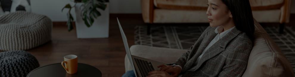 Womeon working on laptop